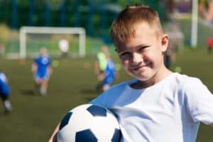 young boy playing sports in the Smoky Mountains