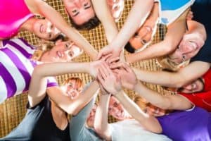 Sports team puts all hands in
