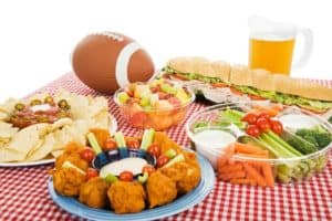 Table filled with food for a Super Bowl party