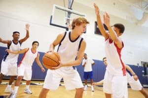 Young men playing basketball in Gatlinburg.
