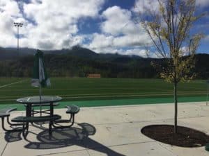 A photo of a field and the mountains at Rocky Top Sports World.
