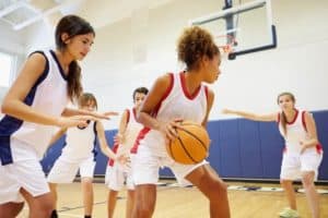 Young women playing in a Smoky Mountain basketball tournament.
