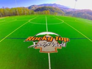 A field with views of the mountains at Rocky Top Sports World.