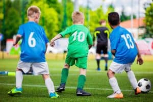 Boys playing soccer.