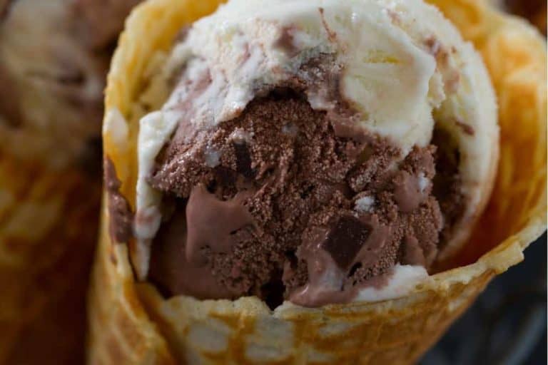 A blend of chocolate and vanilla ice cream in a waffle cone.