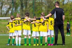 youth sports team on soccer field