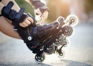 person putting on roller blades
