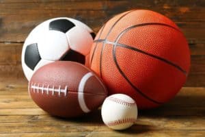 basketball, soccer ball, football, and a baseball