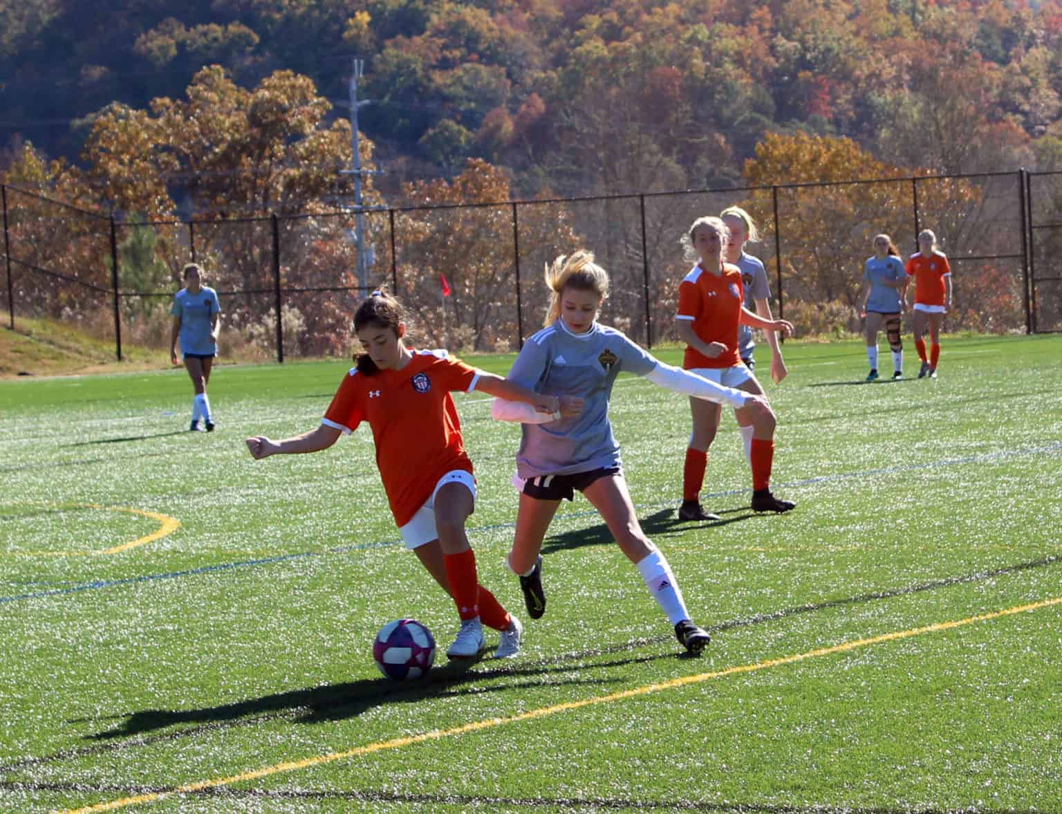 girls playing soccer