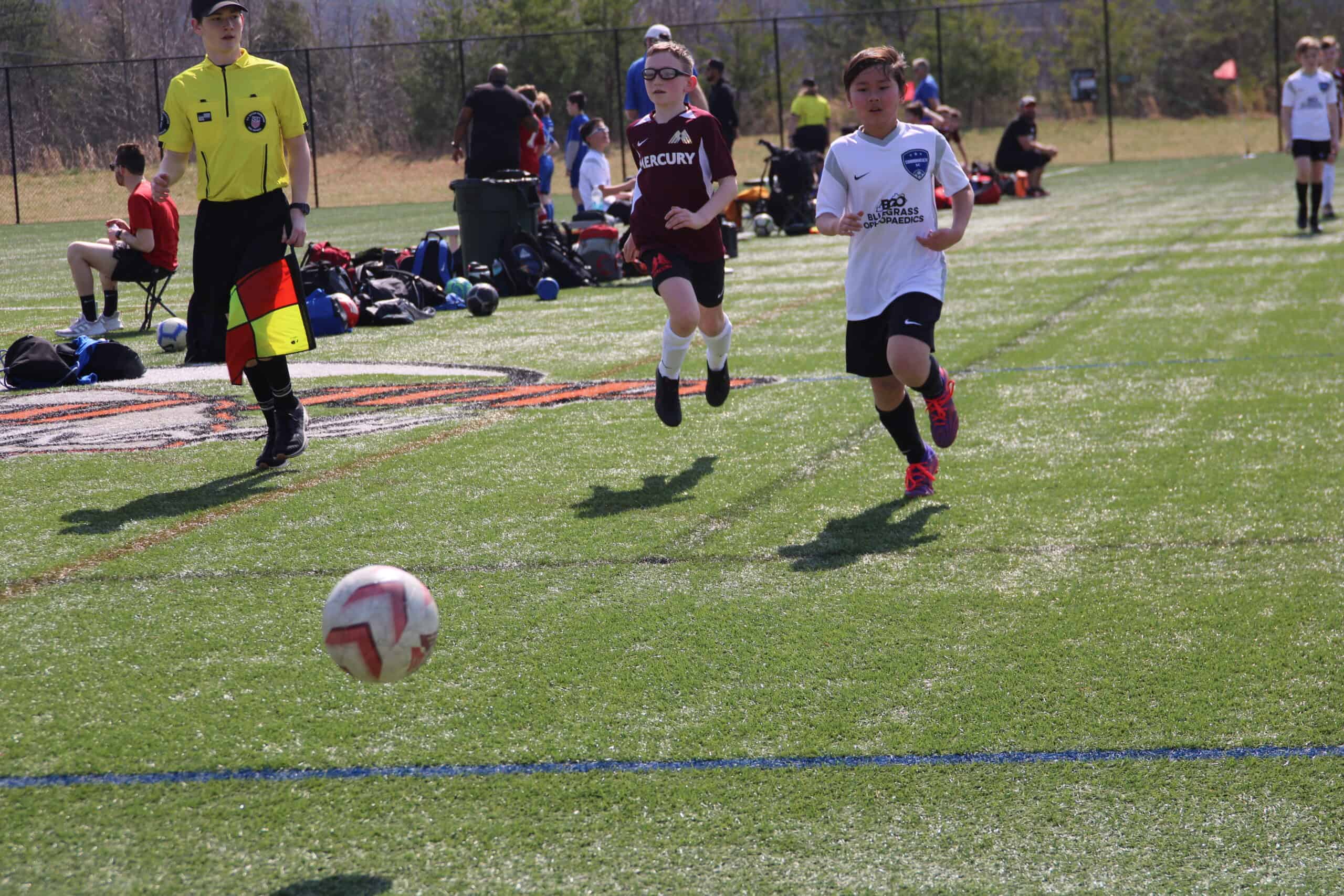 youth boys playing soccer