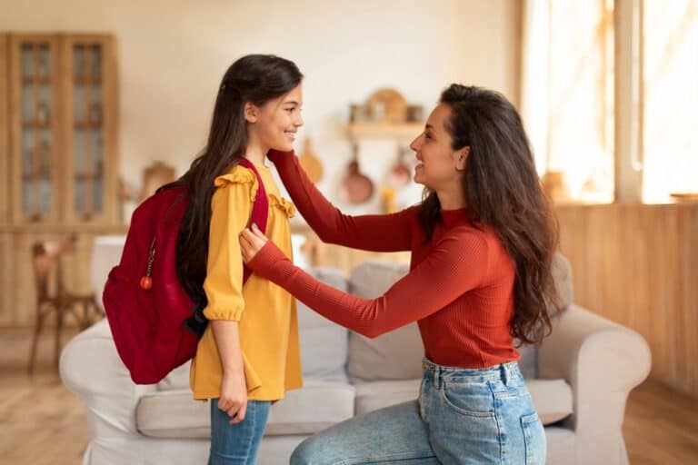 mom getting girl ready for school