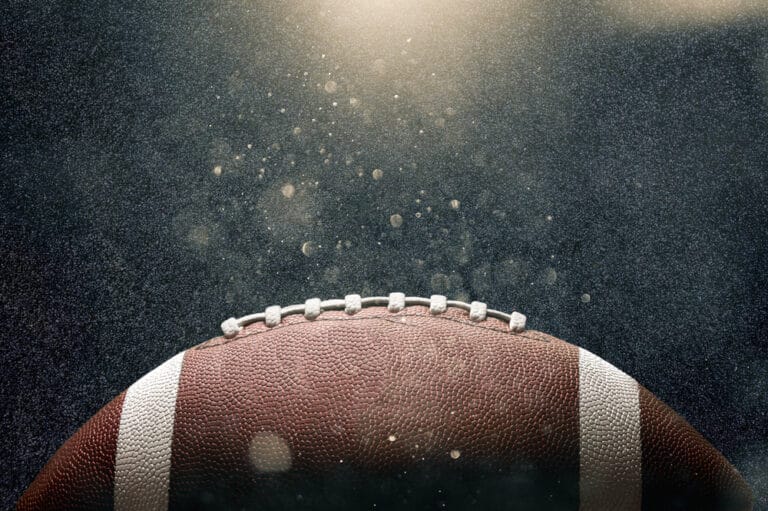 football against black background